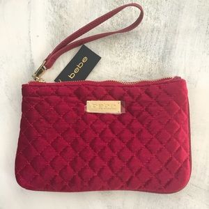 bebe Red Velvet Top Zip Wristlet “Danielle” design